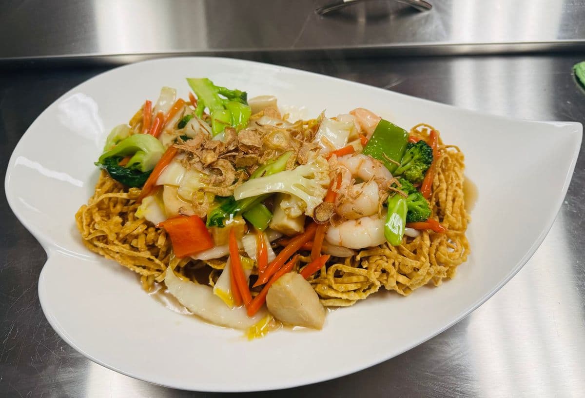 Crispy egg noodles with seafood and vegetables.